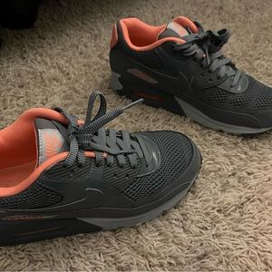 Gray and orange Nike Air Maxs. Size 8.
